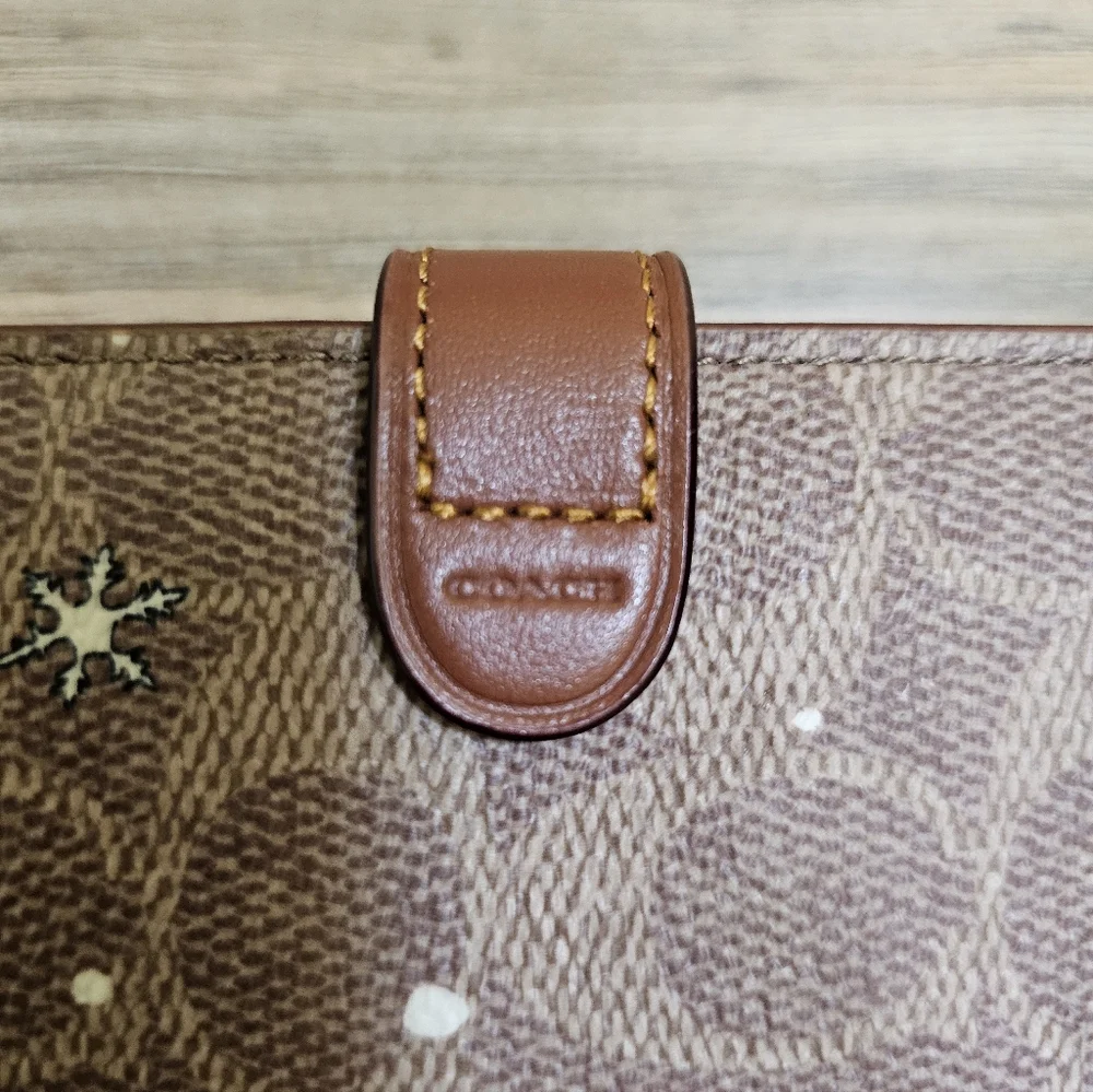 NWOT Coach Signature Canvas Notebook with Holiday Train